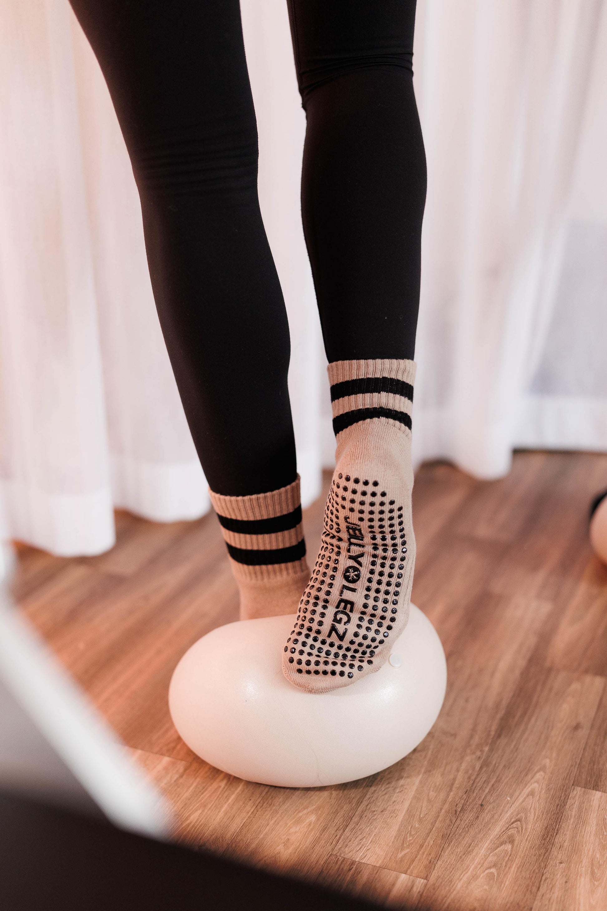 Dusty Dancer beige and black reformer Pilates grip socks with non-slip sole