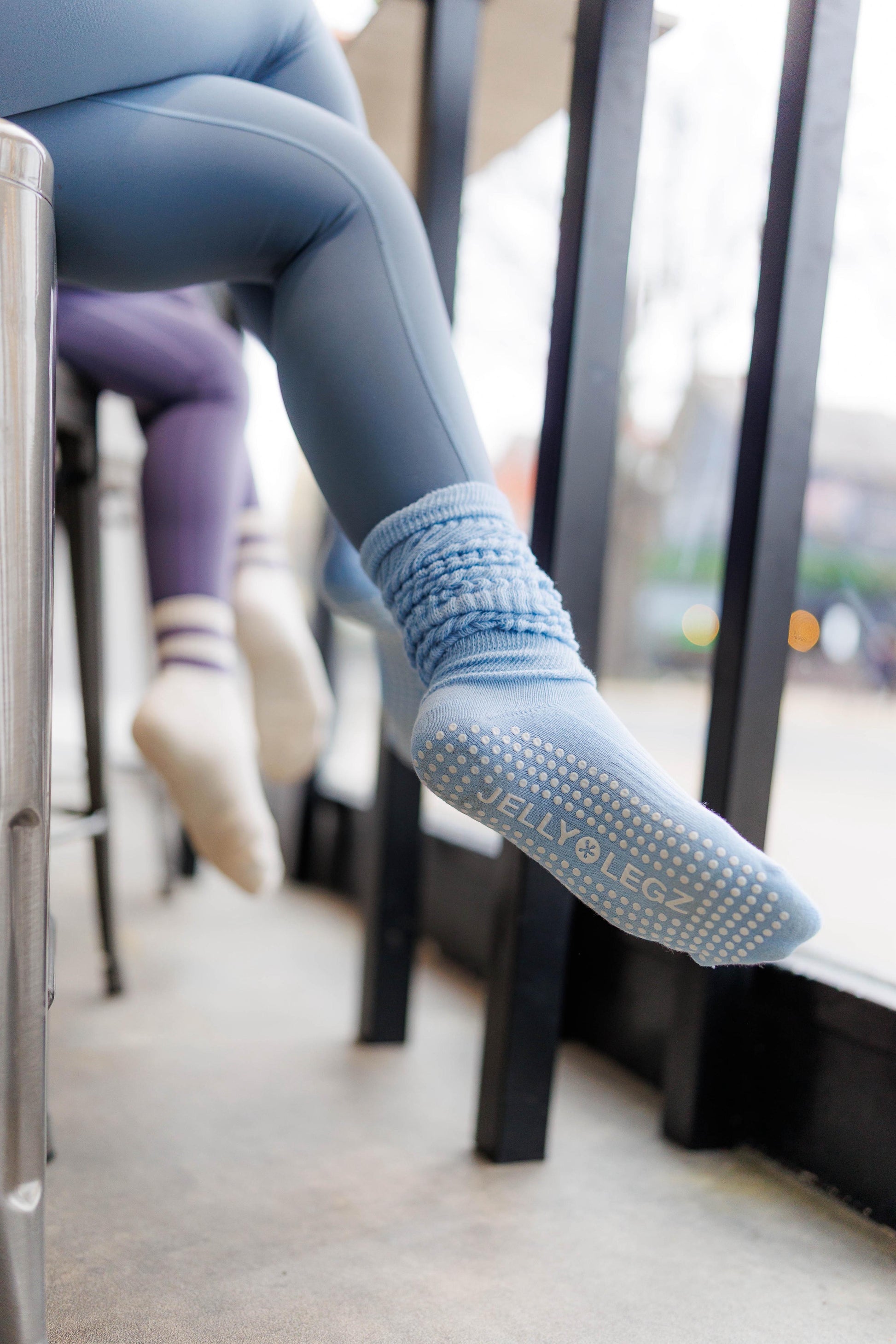 Baby blue pilates grip socks with neutral gym outfit