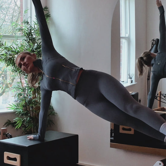 pale blue with white tip luxury grip pilates socks on girl doing pilates